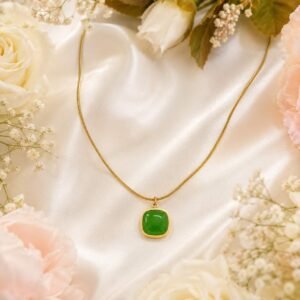 green jade cushion pendant on gold plated chain