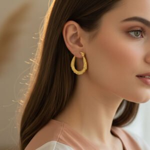 engraved gold toned hoop earrings
