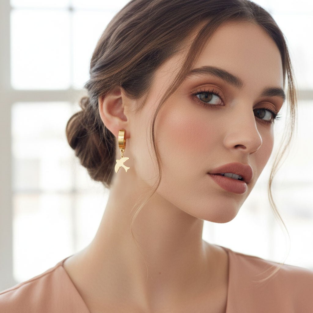 gold bird drop earrings gold bird drop earrings