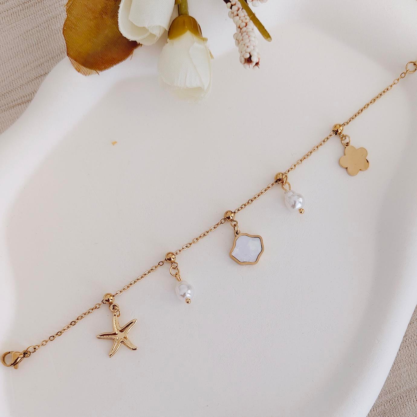 ocean charm pearl drop bracelet ocean charm pearl drop bracelet